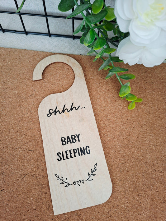 Accroche porte bébé dort